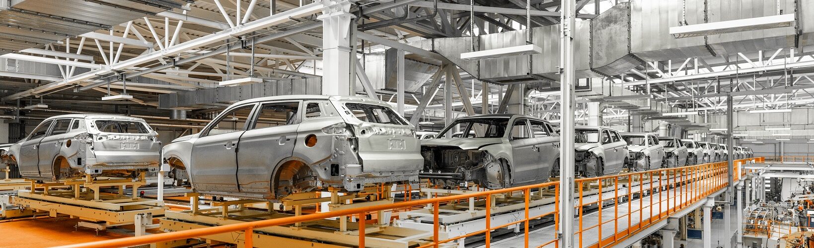 Automobile production line. Welding car body. Modern car assembly plant